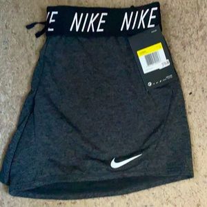 Black Nike Dri-Fit women’s training shorts.